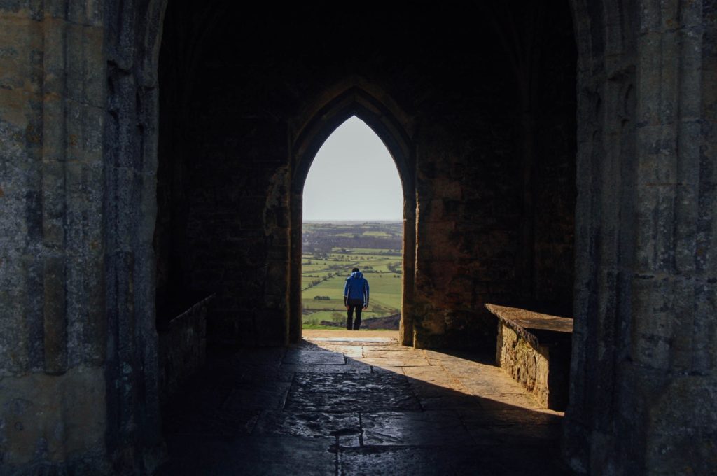 Finding Our Way Back to God_man in lighted church doorway