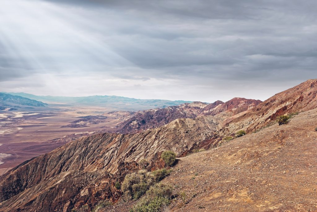 When You Need to Know Angels Have You_rocky, barren mountains with rays shining down from top left to bottom right